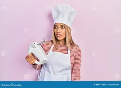 beautiful-hispanic-woman-holding-pastry-blender-electric-mixer-looking-sleepy-tired-exhausted-fatigue-hangover-lazy-eyes-248912327.webp