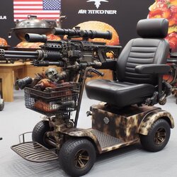 mobility-scooter-with-machine-gun-turret-and-a-barbeque-v0-pze7x2tgmuyc1.jpg