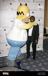 shaun-wright-phillips-and-homer-simpson-at-the-12th-british-academy-of-film-and-television-childrens-awards-at-the-hilton-hotel-park-lane-in-central-london-2DH00RC.jpg